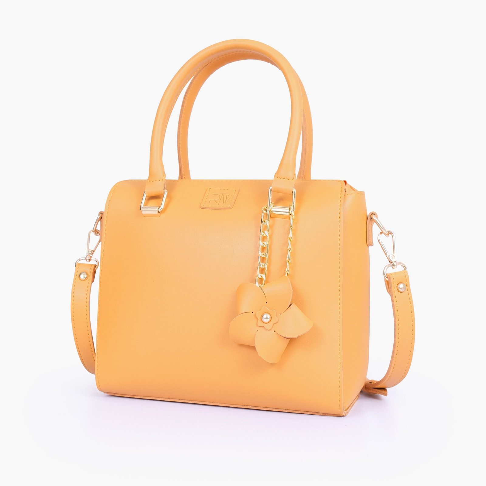 CBF-08-01.jpg Mercura Mustard handbag with flower charm - Image 1
